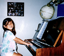 Stacey playing the piano
